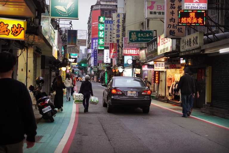 Street photo in Taipei, Taiwan by Casper Ho .
