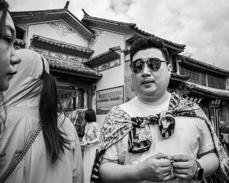 Street photo in Dali, China by Craig Meakin