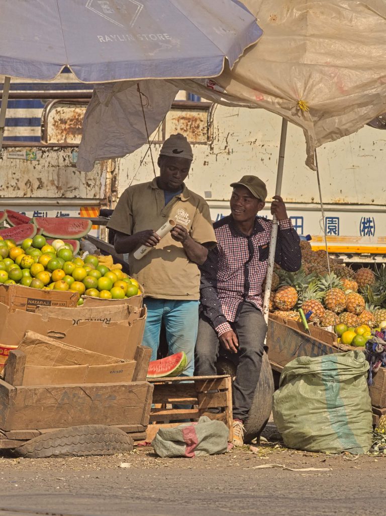 Street photo in Arusha, Tanzania by Stewart Ayling