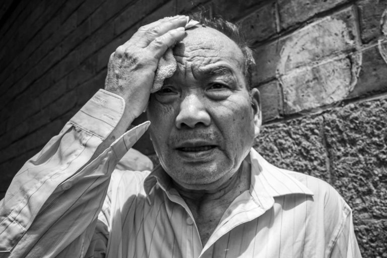 Street photo in Dali, China by Craig Meakin