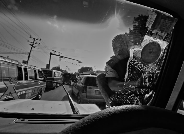 Street photo in Arusha, Tanzania by Stewart Ayling
