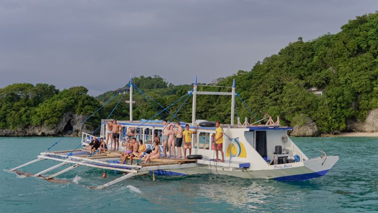Street photo in Boracay Island, Philippines by Leon Castro