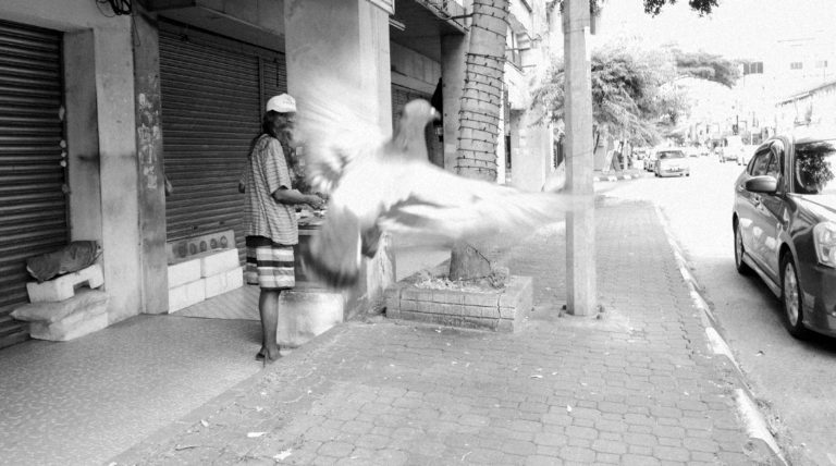 Street photo in Ipoh, Malaysia by Nik TAN