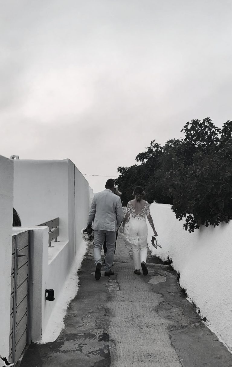 Street photo in Fira, Greece by Julio Alves