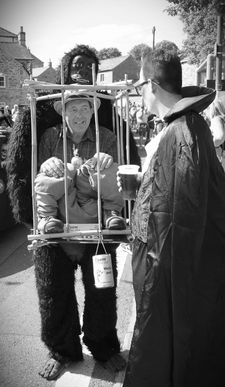 Street photo in Eyam, United Kingdom by Ian Westwood