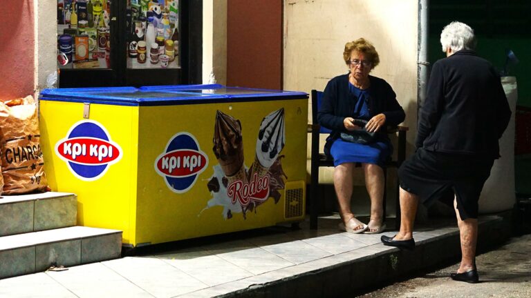Street photo in Agia Effimia, Greece by Chris Bennett