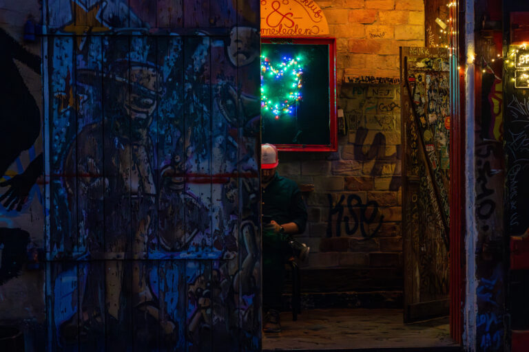 Street photo in Freetown Christiania, Denmark by Dan Lawyer