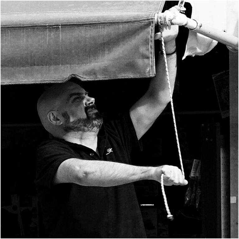 Street photo in Sami, Greece by Chris Bennett