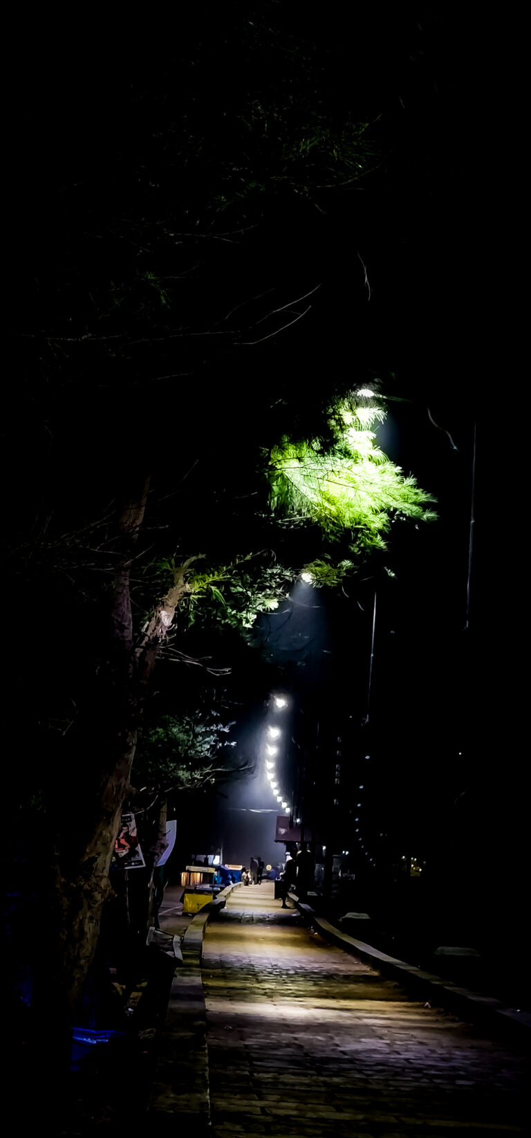 Street photo in Kannur, India by Midhun Kuttiyadan