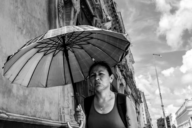 Street photo in Merida, Mexico by Duncan Aitken