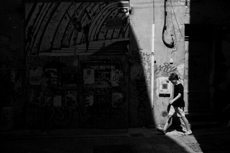 Street photo in Arles, France by David Makima