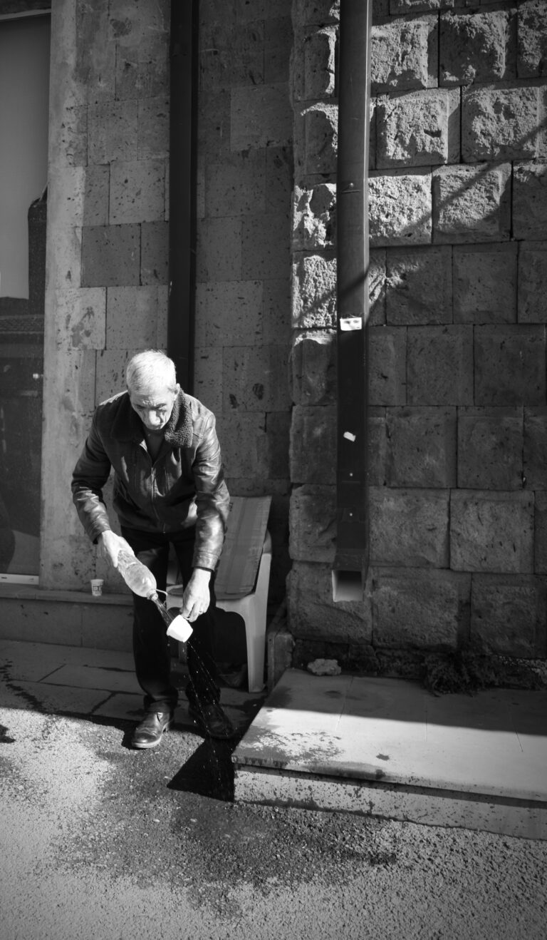 Street photo in Gyumri, Armenia by Rodrigo Marcotich
