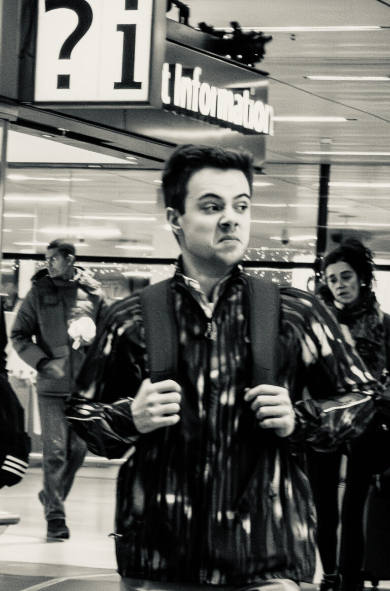 Street photo in AX Schiphol, Netherlands by Dan Lawyer