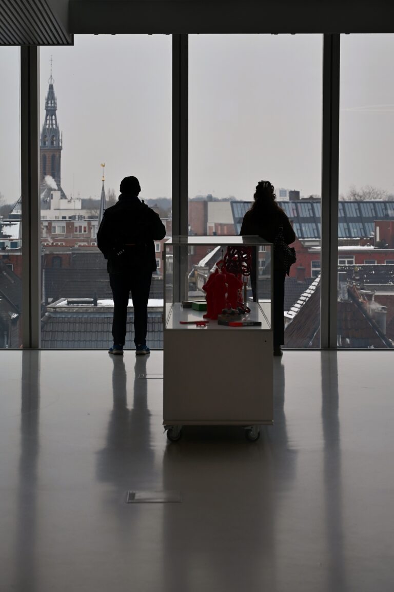 Street photo in Nieuwe Markt, Netherlands by Max Jensch