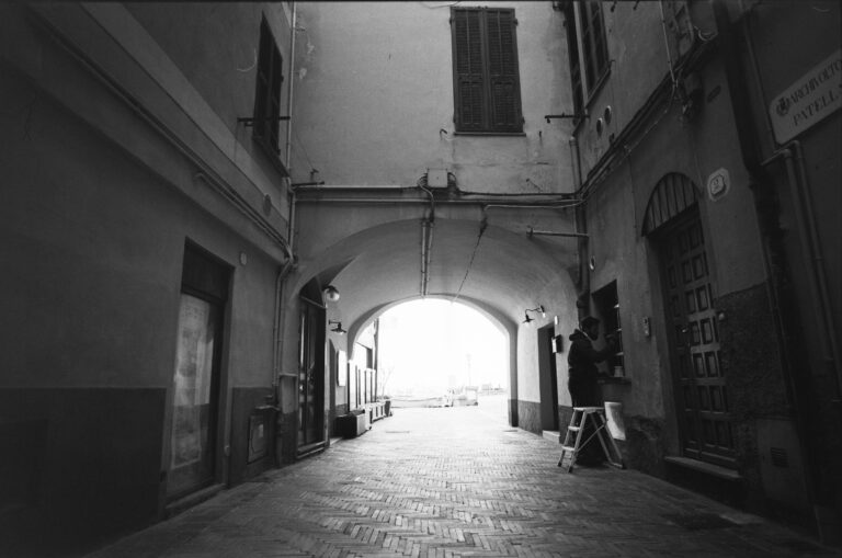 Street photo in Alassio, Italy by Valentino Passerini