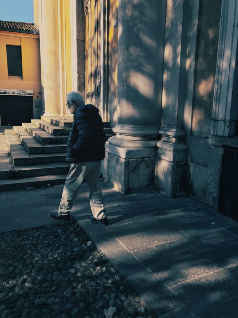 Street photo in Cremona, Italy by Andrea Mondini