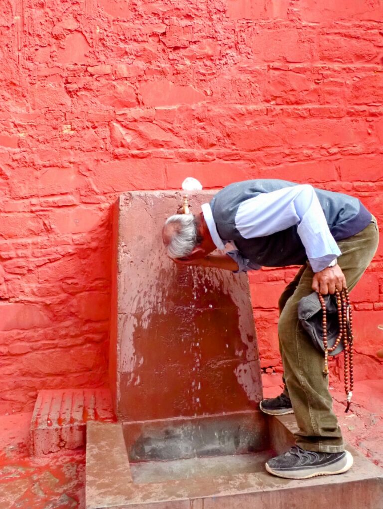 Street photo in Shigatse, China by Nik TAN