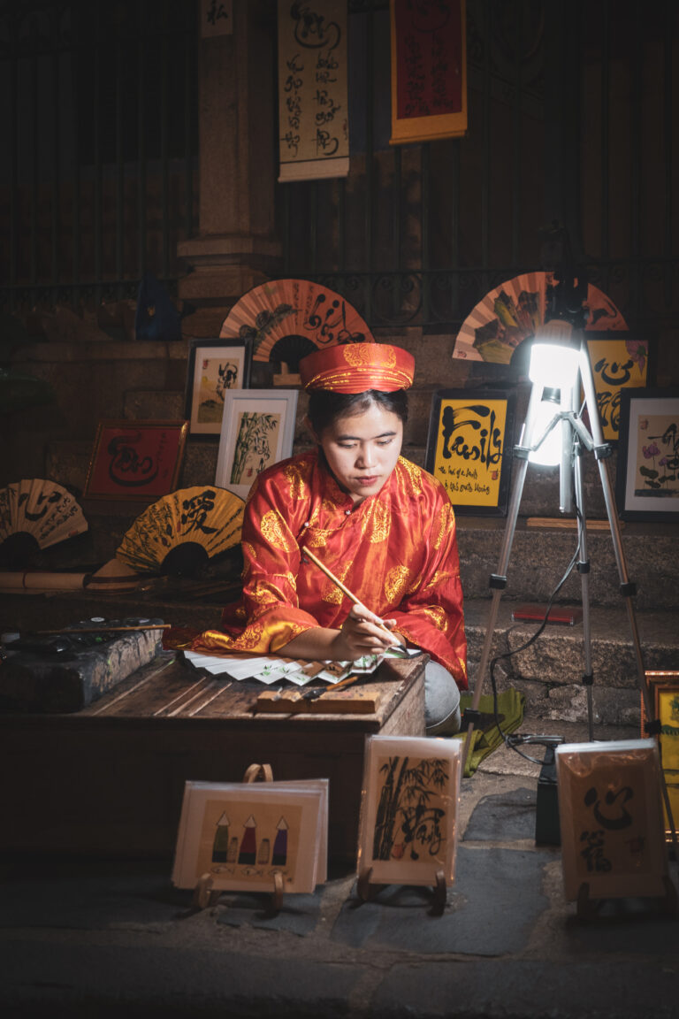 Street photo in Hội An, Vietnam by Gérald Ambroise