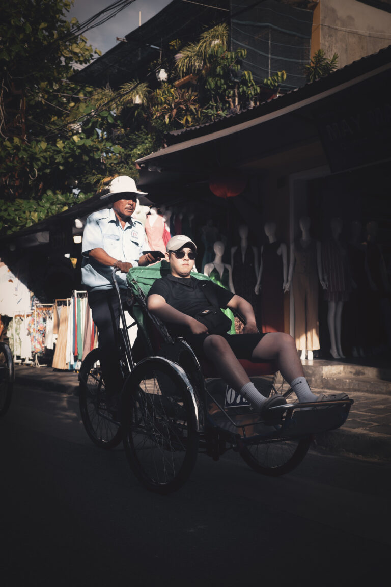 Street photo in Hội An, Vietnam by Gérald Ambroise