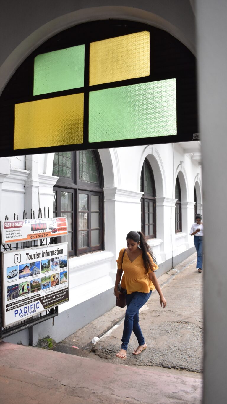 Street photo in Kandy, Sri Lanka by Rodrigo Marcotich