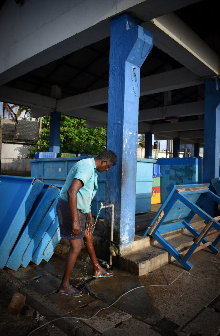 Street photo in Hikkaduwa, Sri Lanka by Rodrigo Marcotich