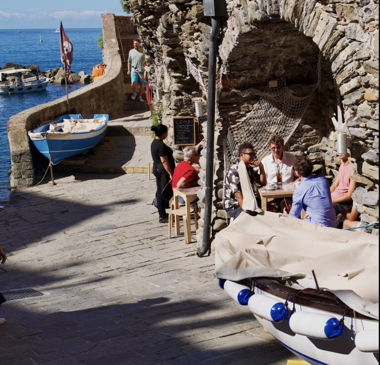 Street photo in Cinque Terre, Italy by David Sheppard
