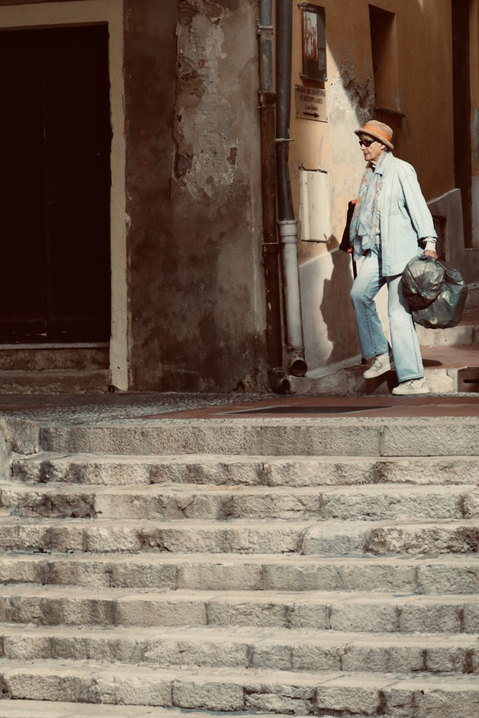 Street photo in Menton, France by Michael Kjær