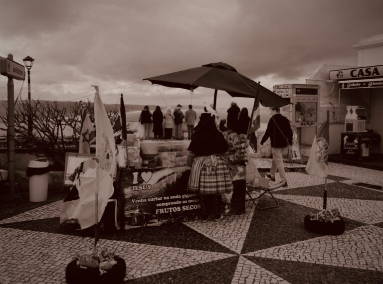Street photo in Nazaré, Portugal by David Sheppard