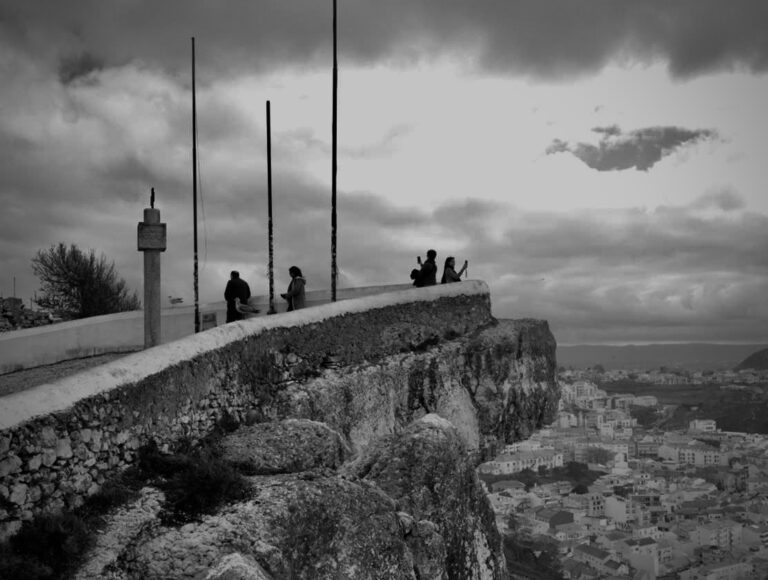 Street photo in Nazaré, Portugal by David Sheppard