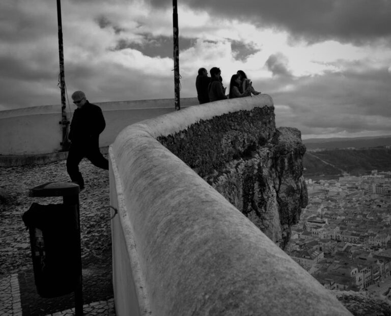 Street photo in Nazaré, Portugal by David Sheppard