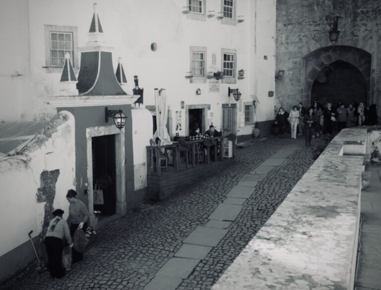 Street photo in Óbidos, Portugal by David Sheppard