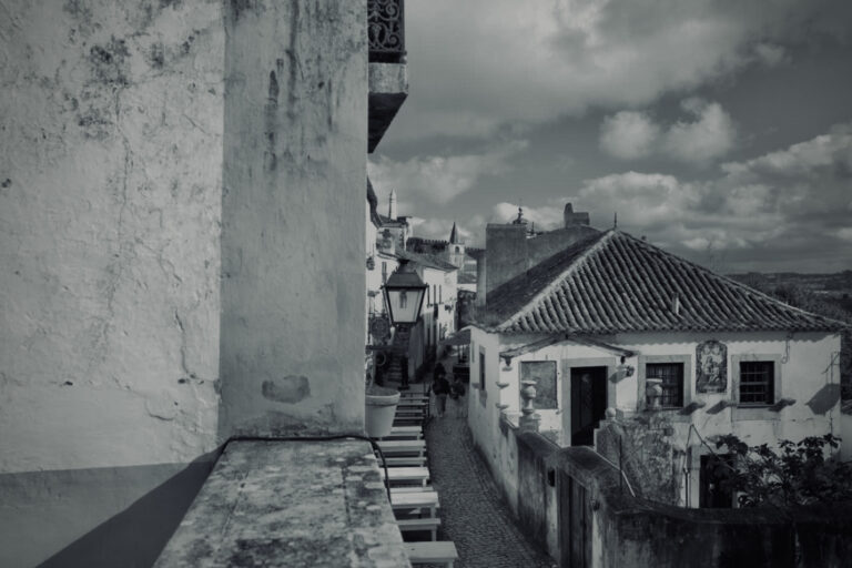 Street photo in Óbidos, Portugal by David Sheppard