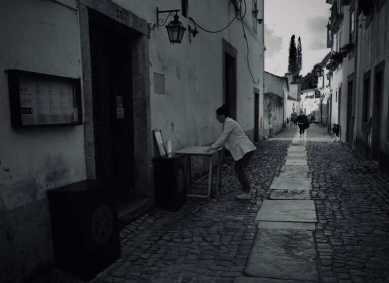 Street photo in Óbidos, Portugal by David Sheppard