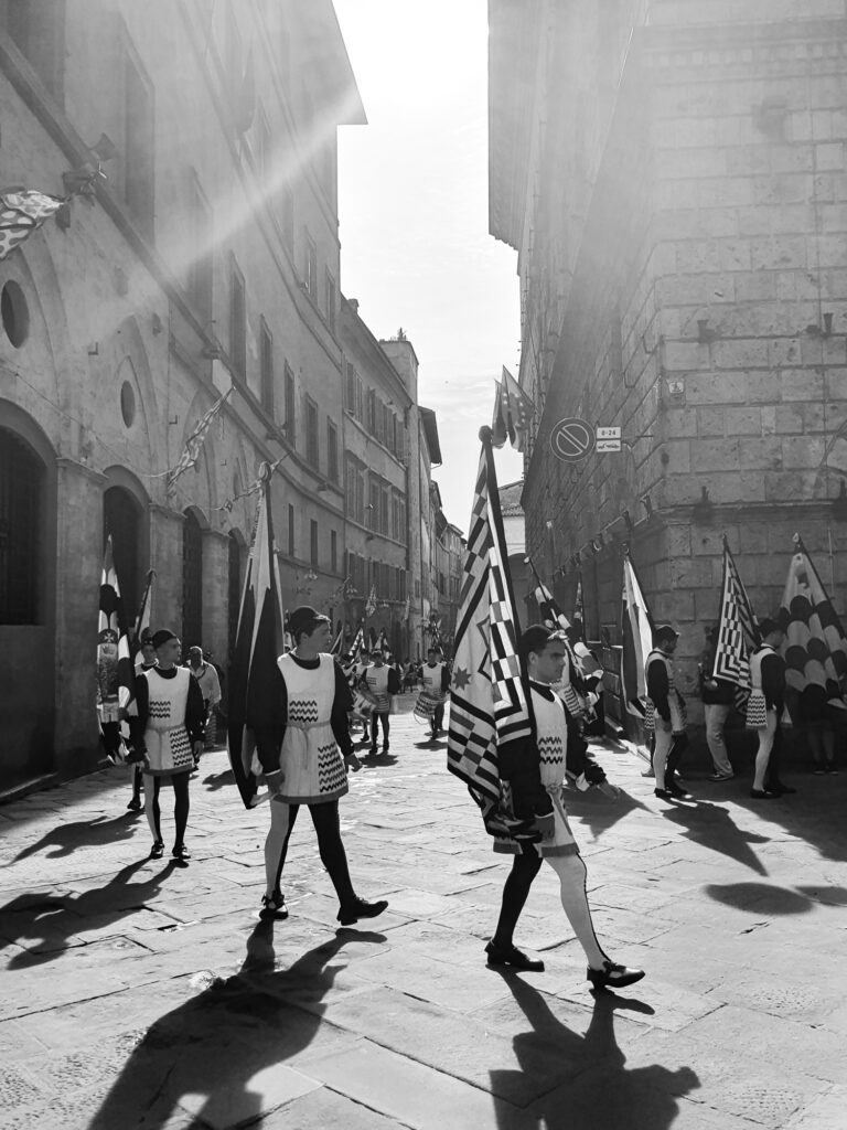 Street photo in Siena, Italy by Diego Ponzuoli