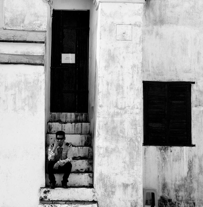Street photo in Macao by Kevin Ono